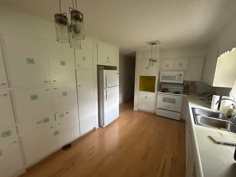 Large kitchen with lots of storage space and coffee nook.