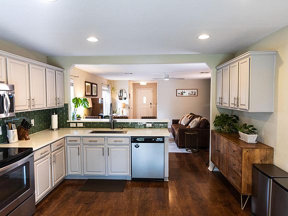 Kitchen with view of downstairs living area