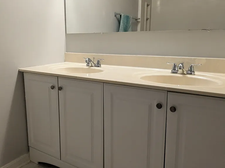 2nd Restroom featuring two hand sinks