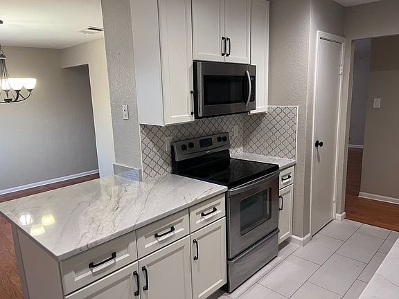 View of kitchen into dining room