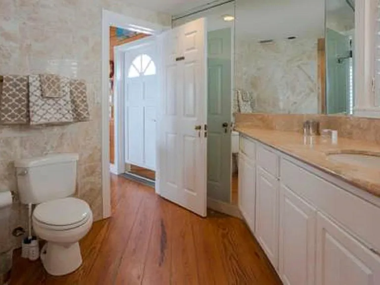 Master bath downstairs with Marble shower and countertops
