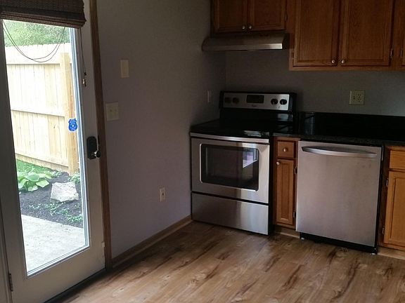 Kitchen which walks out to your backyard and patio!