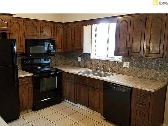 Large Eat-In Kitchen; all interior photos at 525 Beach; similar finish at 465-473.