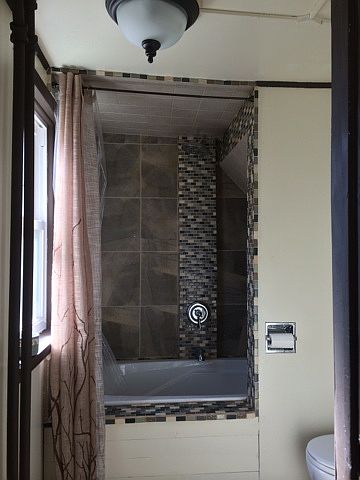new shower and jacuzzi tub