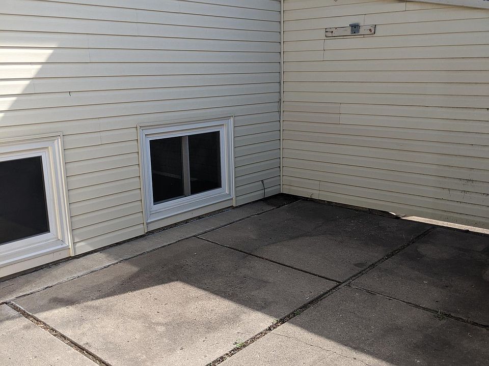 patio between garage and home