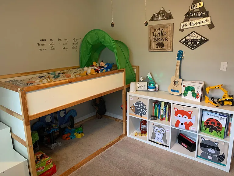 Bedroom 2. Vinyl on the wall will be removed.
