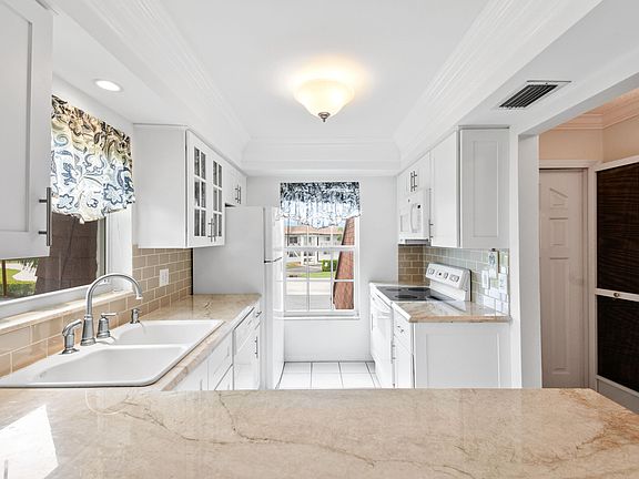 3rd image of 10040 Meridian Way N #206