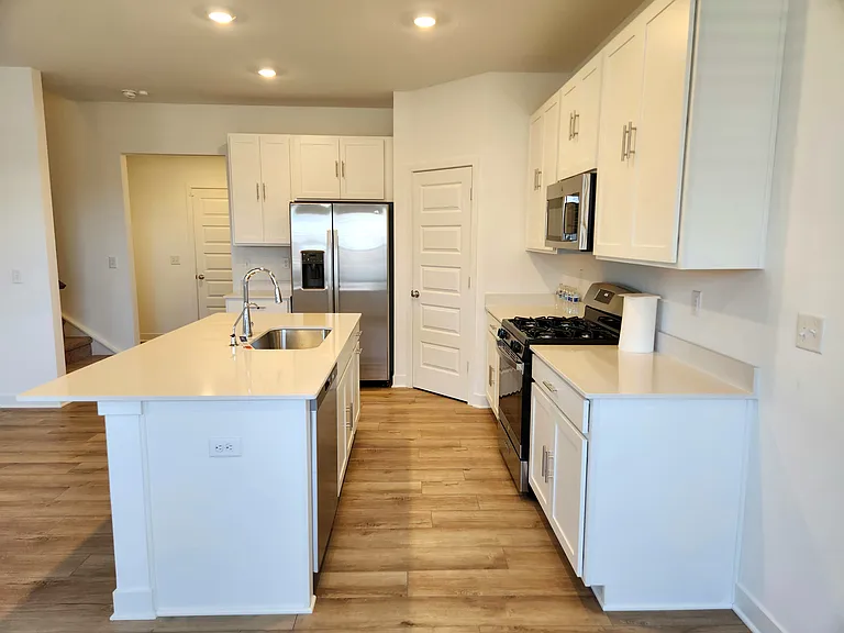 Spacious Open Kitchen with Quartz Counter tops