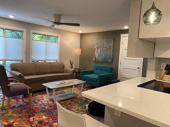 View of living room from the breakfast bar off the kitchen