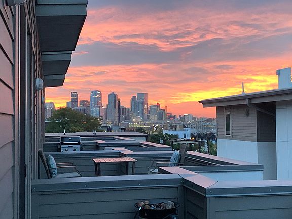Sunrise views over downtown from rooftop deck. No filter needed!