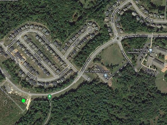Location indicated by the bright green dot; coming in on Grays Wood Blvd, turn left onto Wood Thrush after the Grays Woods Park.