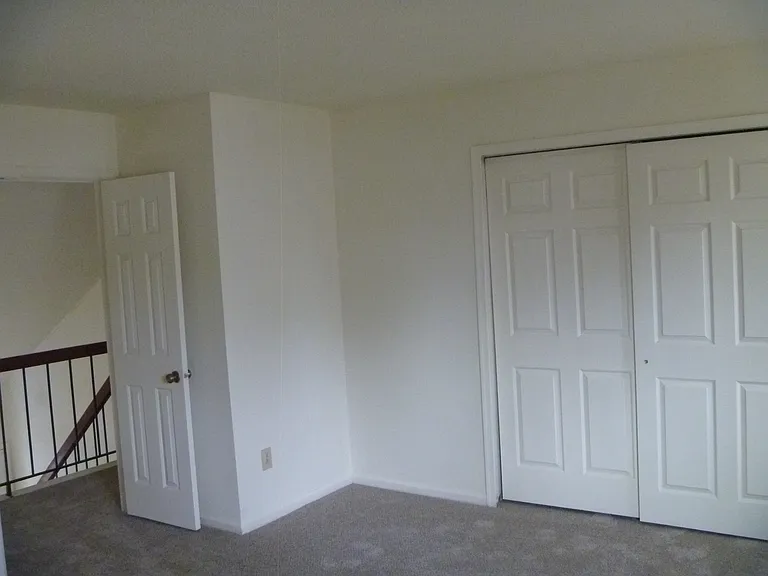 Upstairs bedroom facing front.