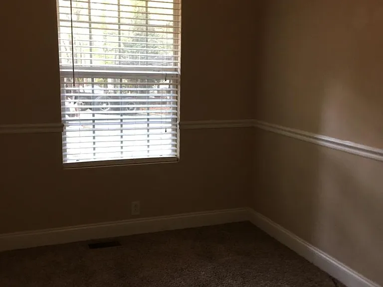 Bedroom 3, only room with carpeting
