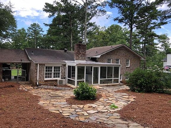 Backyard view of home - sunroom