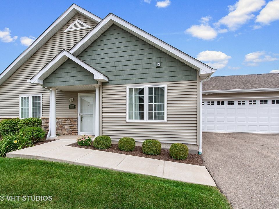 This is the front of the condo. They are attached at the garages. This has a 2 car garage and in the