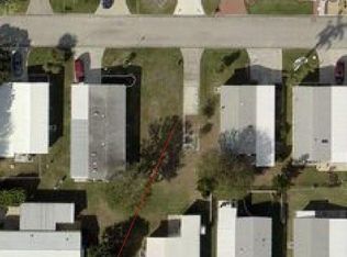 452 Dolphin Cir, Barefoot Bay, FL 32976
