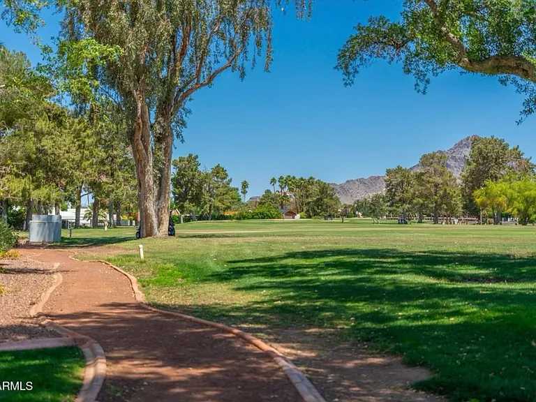 Beautifully landscaped grounds include hiking paths.