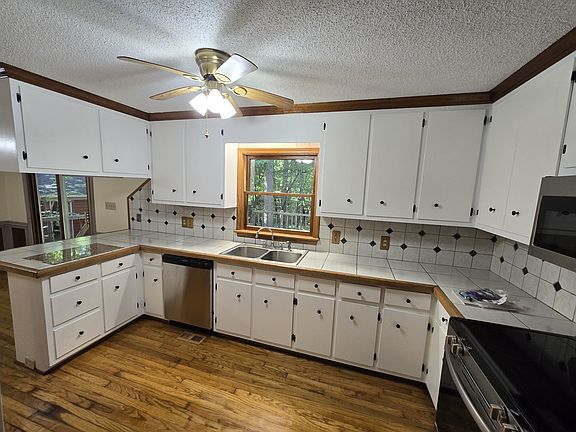 Kitchen with tile countertops