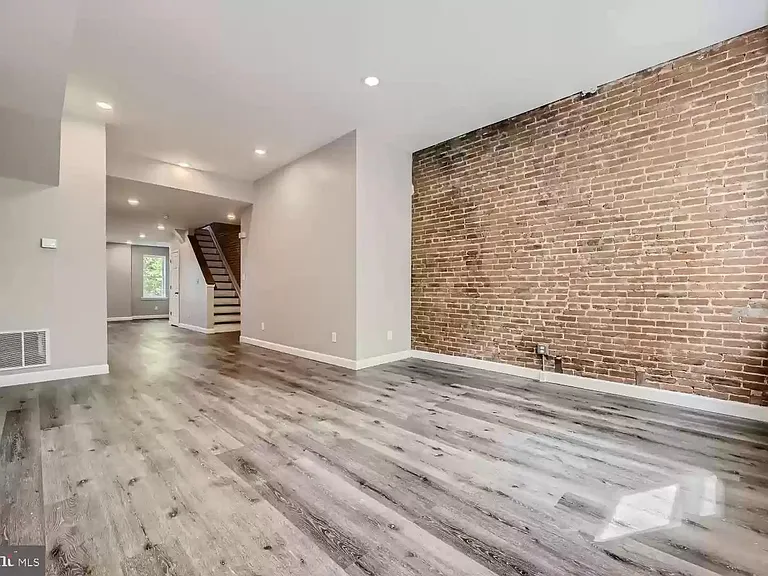 Large Living Area (empty view prior to most recent tenant moving in)