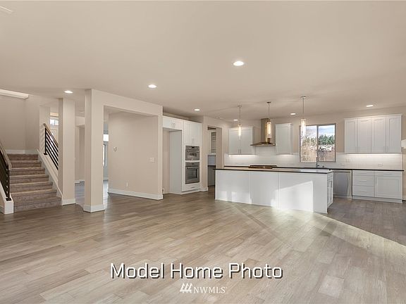Model Home Photo - Same floor plan(Living Room with Open Kitchen)