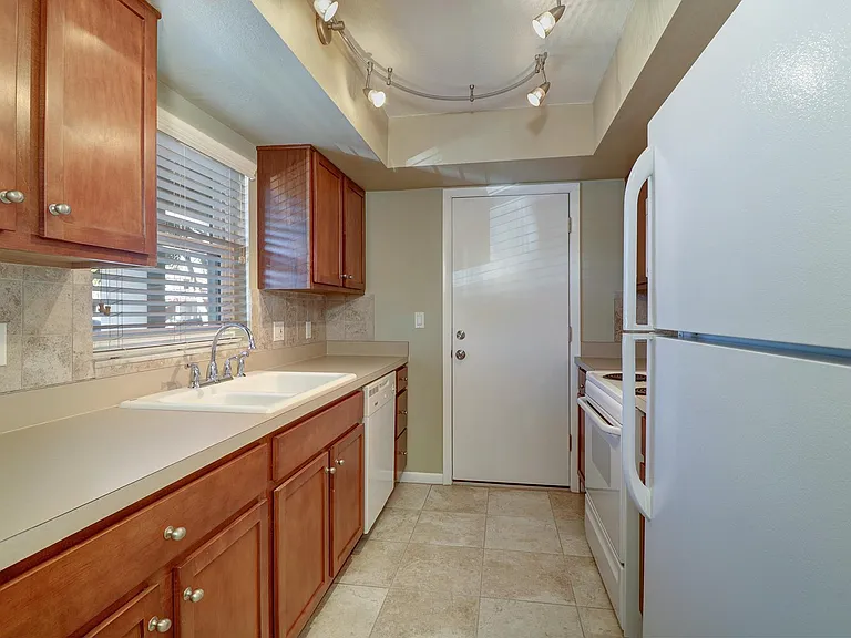 Kitchen has an additional access door