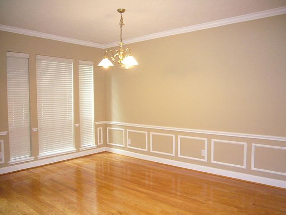   Formal dining room with rail chair