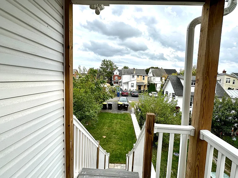 Steps down to yard and parking