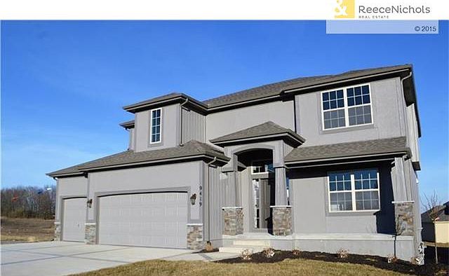 Beautiful two story,with a front porch on a corner lot