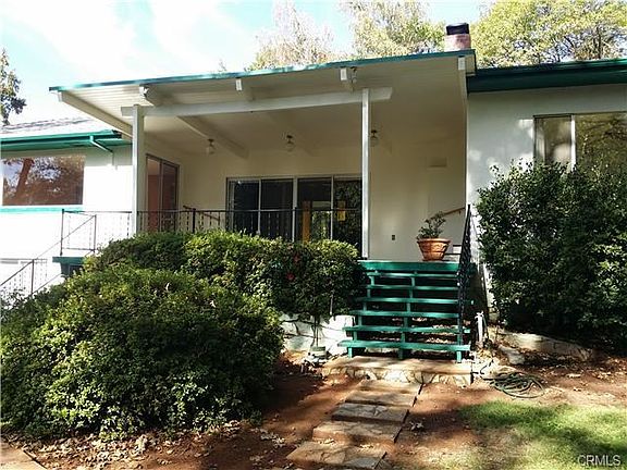 Back patio area with sliding door to living room, sliding door t