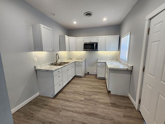Kitchen with under cabinet lighting