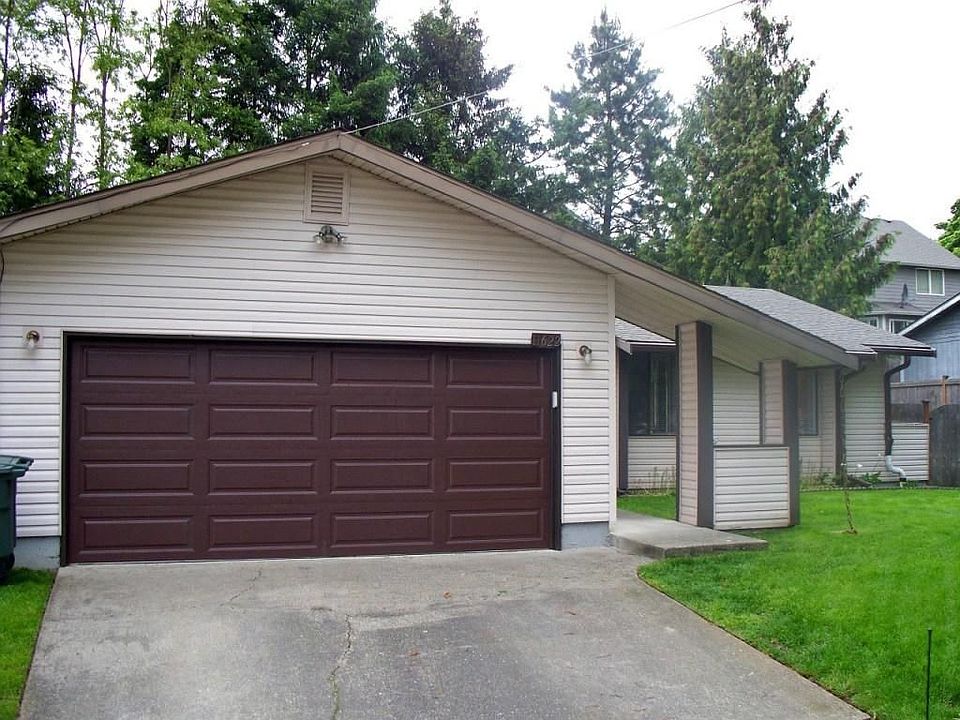Front of home. Nice sized 2 car garage with storage