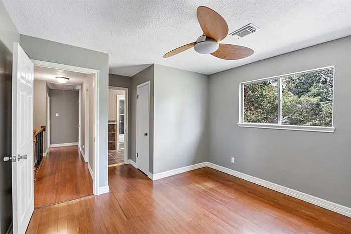 Bedroom 2 with direct access to shared full bathroom.