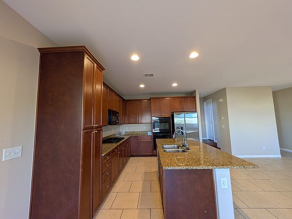 3rd image of 6940 Yellow Cosmos Ave