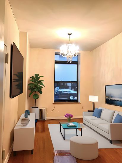 1st image of 408 W 51st St APT 103