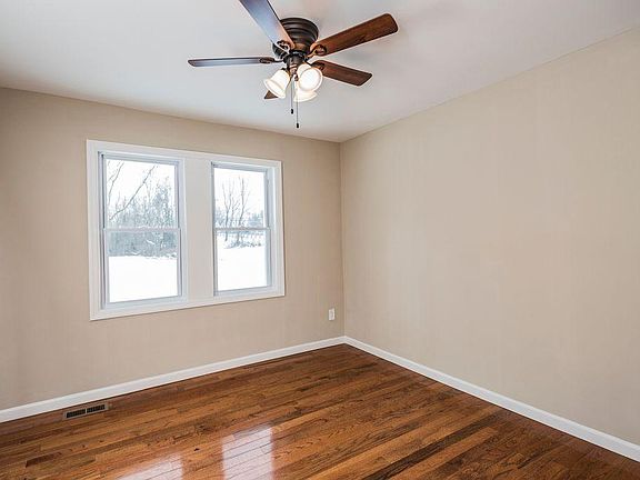 Master Bedroom with a fan
