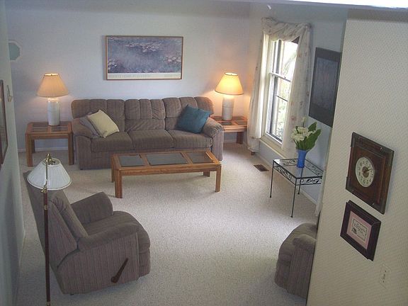 Spacious living room is light and airy