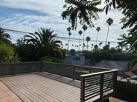 This 450 sq. ft. deck is located off the living room, through sliding glass doors.
It is for this unit's exclusive use.