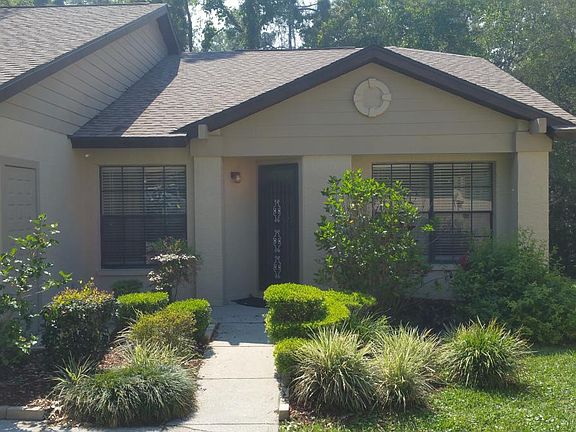 Entry with mature garden