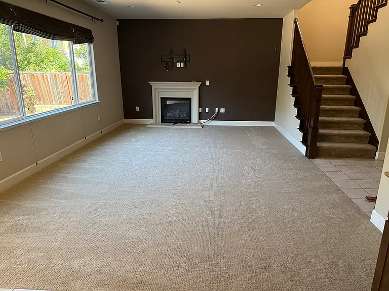 Family room with brand new carpet