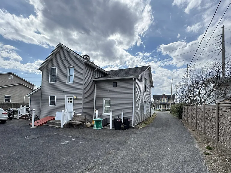 back of home and driveway for bottom unit A