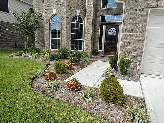  There is a large and very pretty front garden providing beautiful curb appeal.