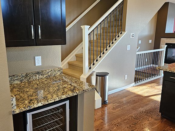 View from kitchen to bedroom level stairs