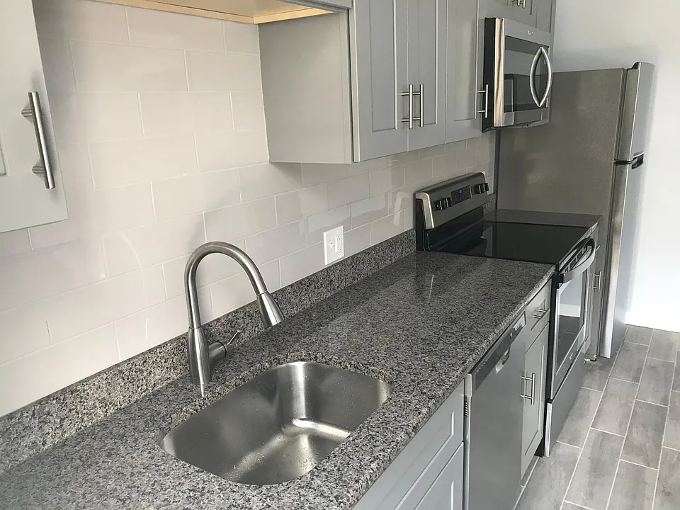 Kitchen (2a & 3a); All new appliances; Electric stovetop; Granite countertops