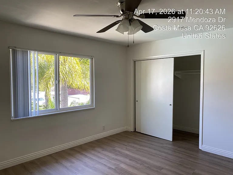 Bedroom with closet and ceiling fan