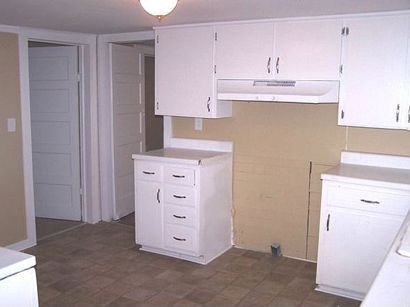 •	Kitchen refinished with new flooring and faucet. 