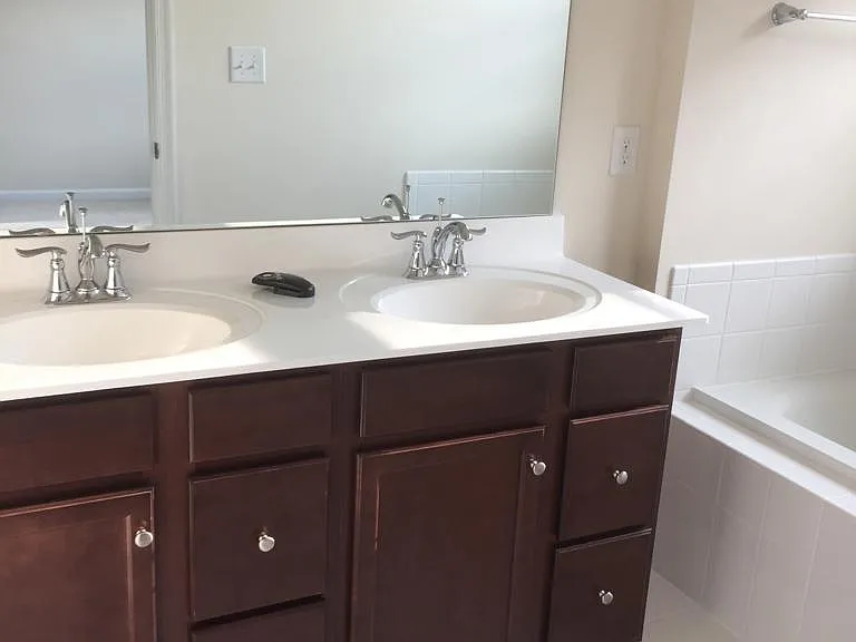 Master bath with double vanity and soak in tub