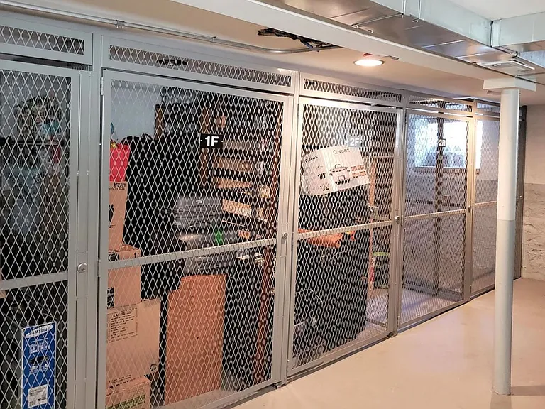 Private secured storage bins for each residence