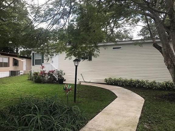 Walkway to carport and storage unit