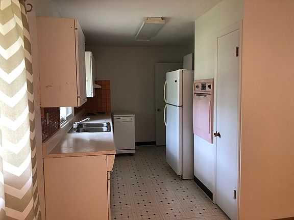 Kitchen area off dining