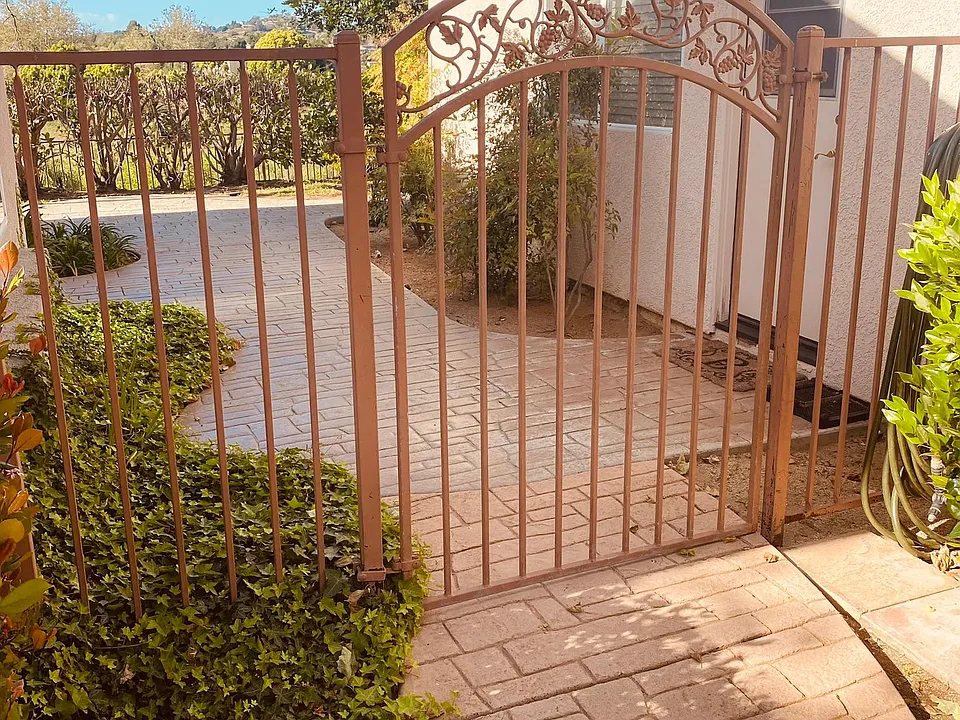 1 Custom gate to your front door, lockable if needed. The casita is on the left and the main house's side entrance is on the right.